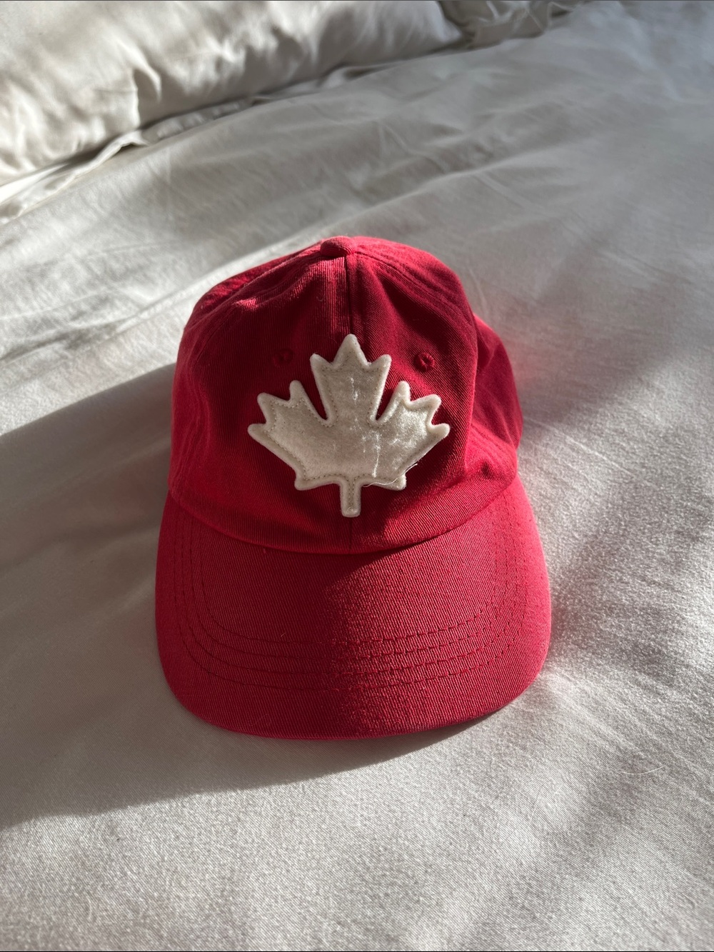 Red Baseball Cap with White Canada Maple Leaf